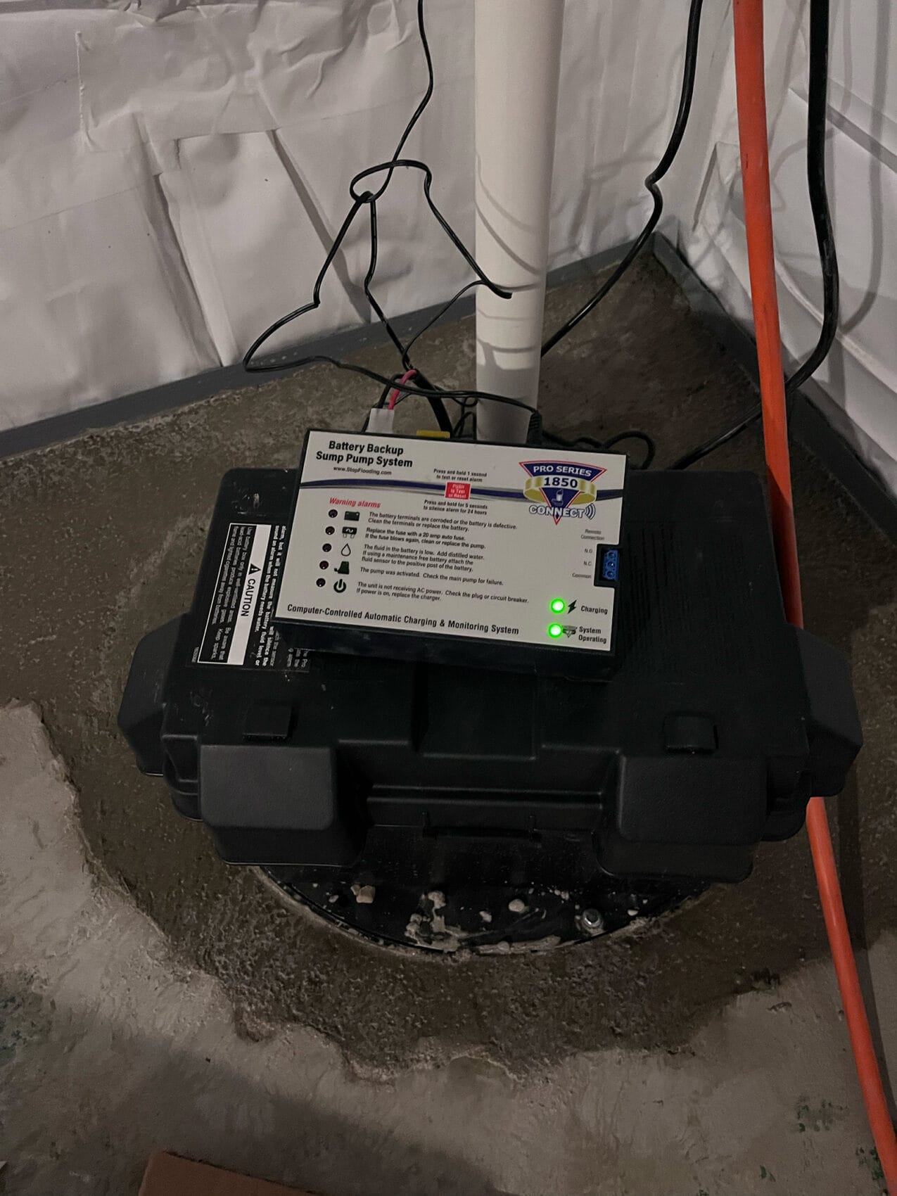 Sump pump with a battery backup